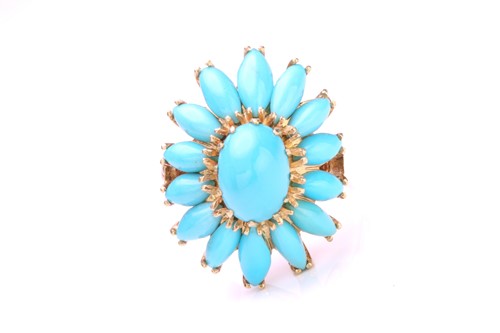 Lot 218 - A turquoise flowerhead ring, comprises a...