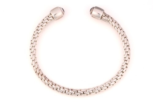 Lot 29 - FOPE - A Silver Fope bangle with sapphires...