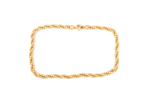 Lot 281 - A bead torsade necklace in yellow metal,...