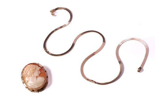 Lot 105 - A shell cameo brooch pendant in 9ct gold and a...
