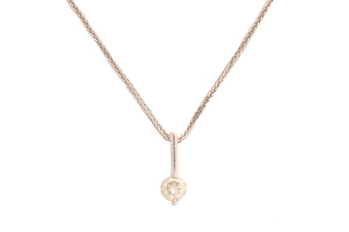 Lot 305 - A diamond drop pendant on chain, a...