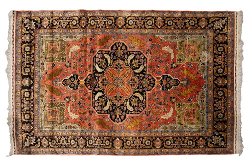 Lot 313 - An old brick red ground Heriz style silk on...