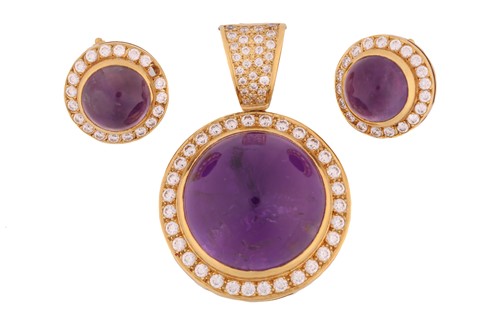 Lot 235 - An amethyst halo pendant and matching earrings;...