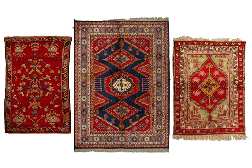 Lot 314 - A small North West Persian rd ground rug with...