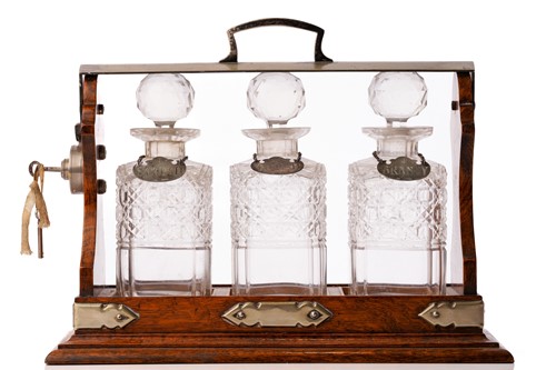 Lot 464 - An Edwardian oak and silver-plated...