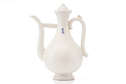 Lot 218 - A Chinese Qinbai-style porcelain wine ewer and...