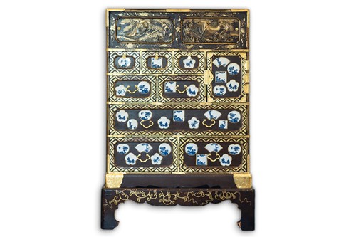 Lot 231 - A Japanese muted brown lacquer Tansu, Meiji,...