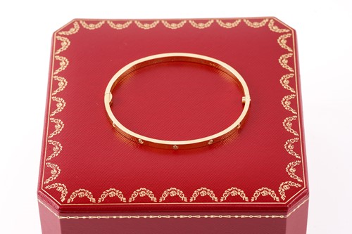 Lot 39 - Cartier - A diamond-set 'LOVE' bangle in 18ct...