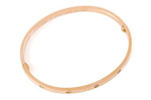 Lot 39 - Cartier - A diamond-set 'LOVE' bangle in 18ct...