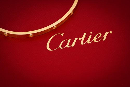 Lot 39 - Cartier - A diamond-set 'LOVE' bangle in 18ct...