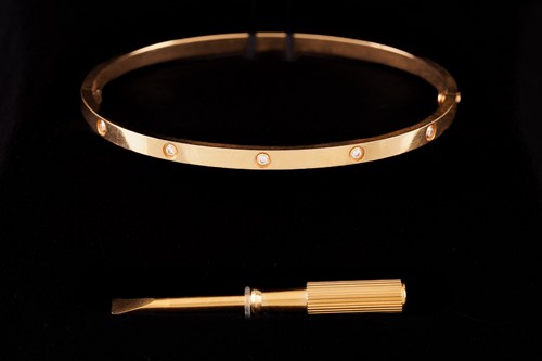 Lot 39 - Cartier - A diamond-set 'LOVE' bangle in 18ct...