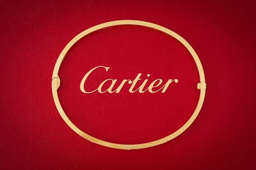 Lot 39 - Cartier - A diamond-set 'LOVE' bangle in 18ct...