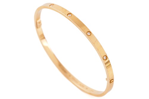 Lot 39 - Cartier - A diamond-set 'LOVE' bangle in 18ct...