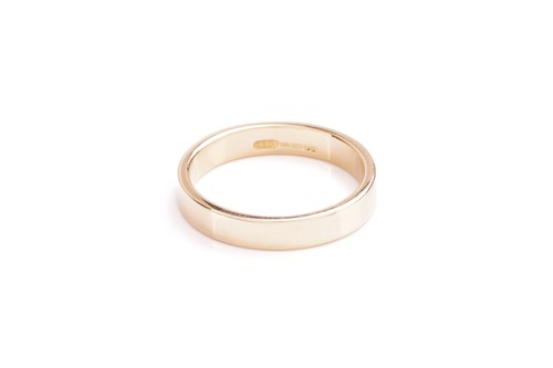 Lot 110 - An 18 carat gold wedding band; plain squared...
