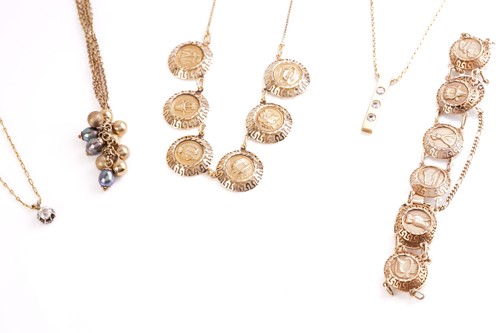 Lot 48 - An 18 carat gold and diamond pendant; the...