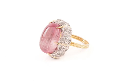 Lot 16 - A pink tourmaline and diamond cocktail ring,...