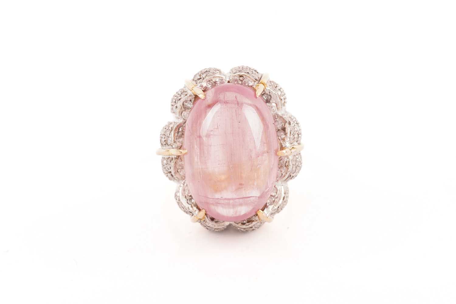 Lot 16 - A pink tourmaline and diamond cocktail ring,...