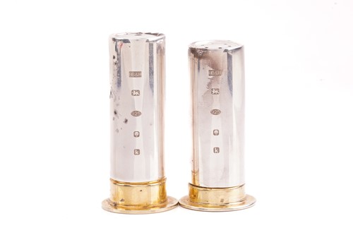 Lot 492 - A pair of salt and pepper shakers modelled...