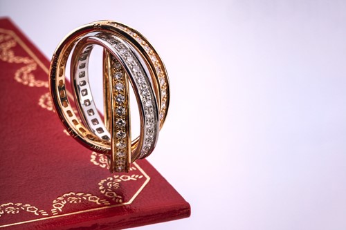 Lot 1 - Cartier - 'Trinity' diamond ring, containing...