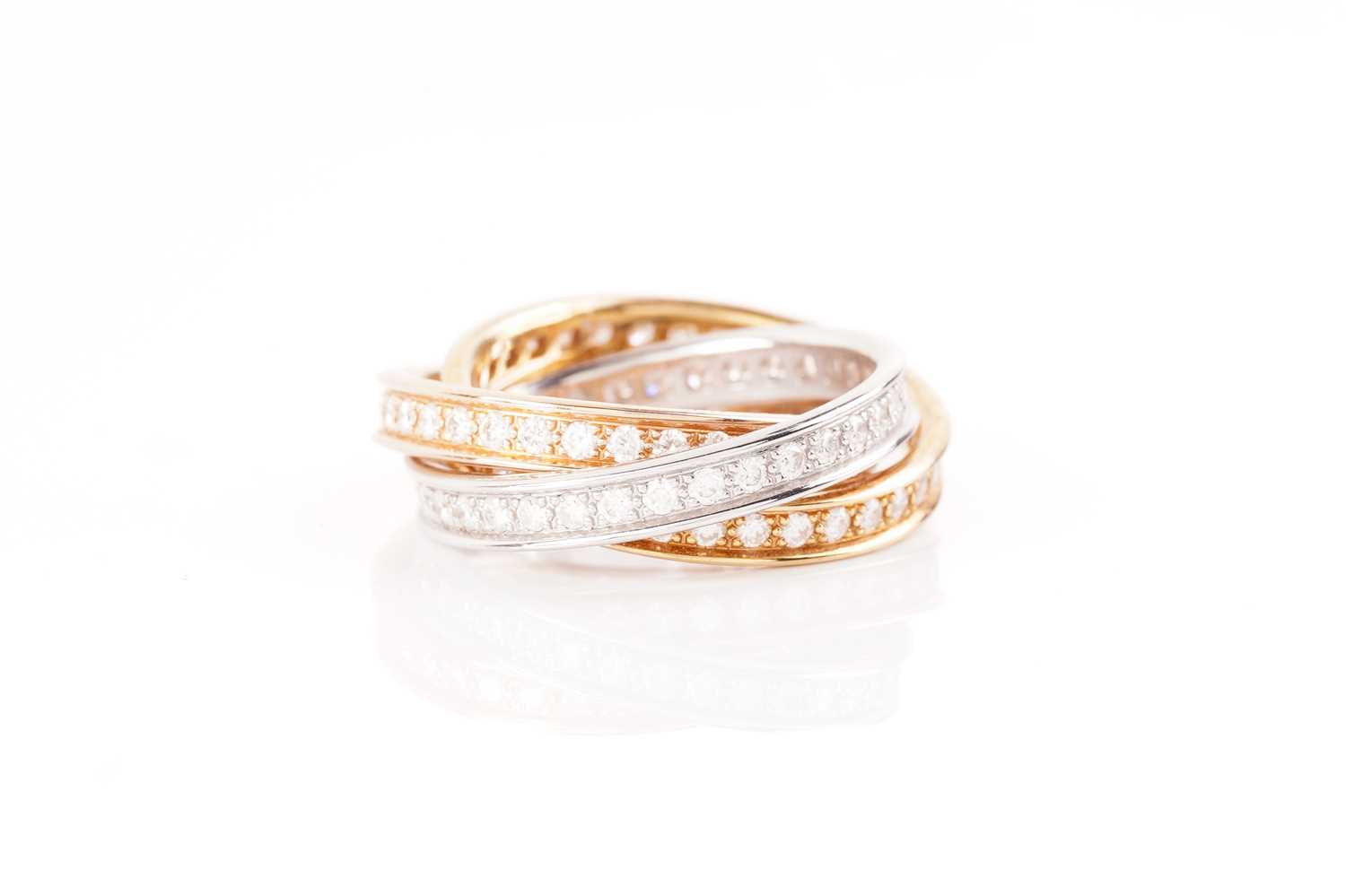 Lot 1 - Cartier - 'Trinity' diamond ring, containing...