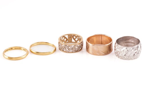 Lot 176 - Two 22ct gold wedding bands together with...
