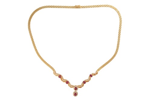 Lot 88 - A ruby and diamond necklace, the pendant...