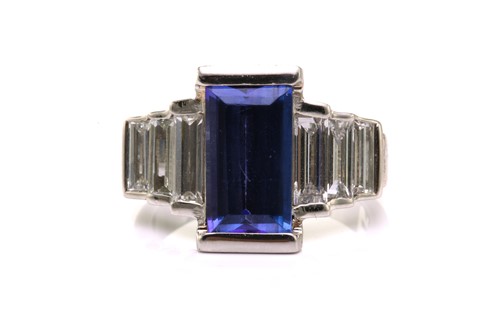 Lot 21 - An Art Deco-style platinum tanzanite and...