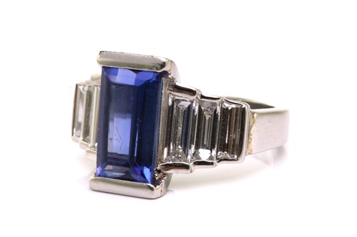 Lot 21 - An Art Deco-style platinum tanzanite and...