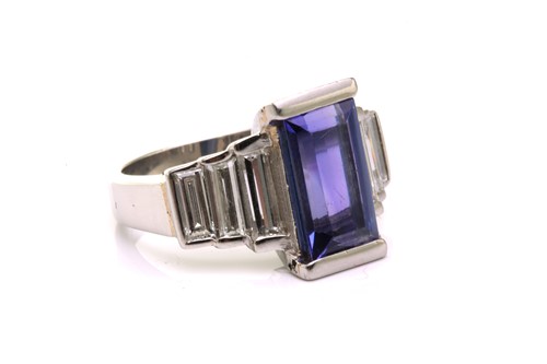 Lot 21 - An Art Deco-style platinum tanzanite and...