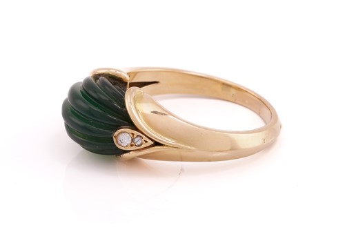 Lot 289 - Van Cleef and Arpels. A carved green...