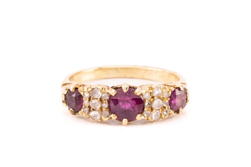 Lot 6 - A late Victorian ruby and diamond half-hoop...