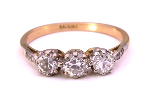 Lot 217 - A diamond trilogy ring, set with three...