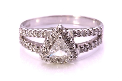 Lot 234 - A trillion-cut diamond cluster ring in 18ct...