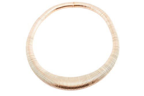 Lot 216 - A graduated tubogas necklace, of a flexible...