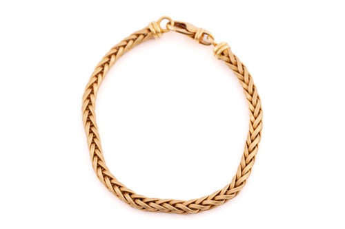Lot 40 - Boodle & Dunthorne - A wheat link bracelet in...