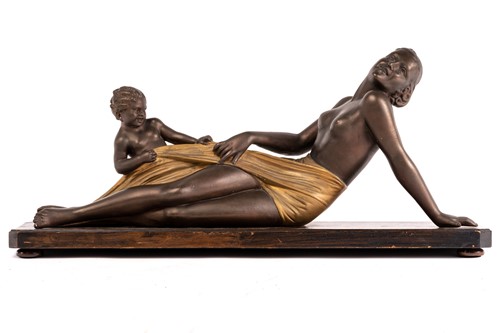 Lot 316 - An art deco bronzed and parcel gilt plaster...