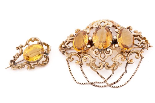 Lot 256 - A late Victorian three stone citrine brooch;...