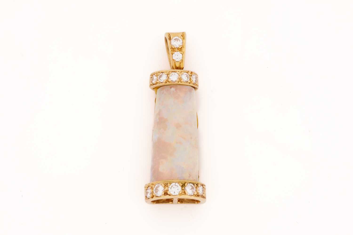 Lot 69 - An opal and diamond pendant, the tapering...