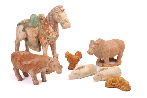 Lot 245 - A small collection of Chinese Mingqi, Tang...