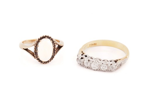 Lot 85 - A precious opal ring and a five-stone diamond...