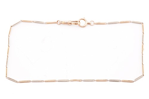 Lot 34 - An early 20th century bi-coloured watch chain;...
