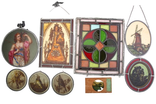 Lot 333 - A 19th-century elliptical stained glass panel...
