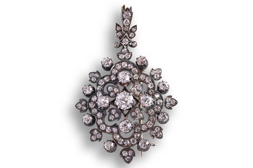 Lot 105 - A Victorian floral pendant brooch set with old-...