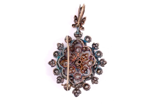 Lot 105 - A Victorian floral pendant brooch set with old-...