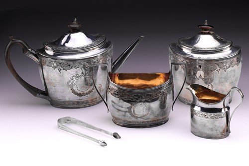 Lot 353 - A matched four-piece George III silver tea set,...
