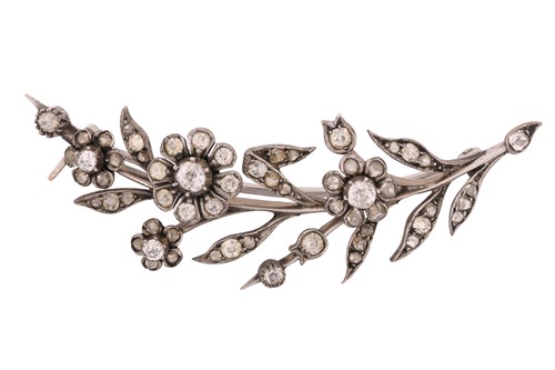 Lot 29 - A daisy spray brooch set with old-cut diamonds,...
