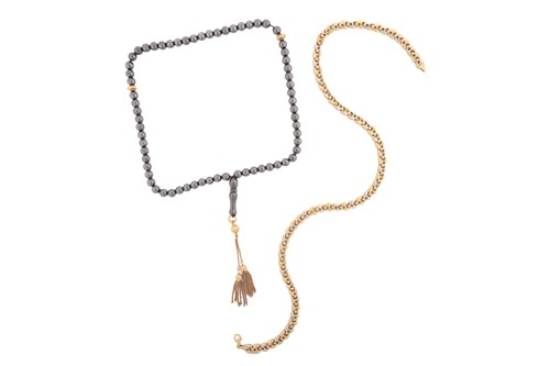 Lot 72 - A hematite prayer beads and a two-tone fancy...