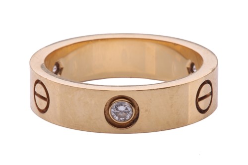 Lot 1 - Cartier - 'Love' ring, the polished band set...