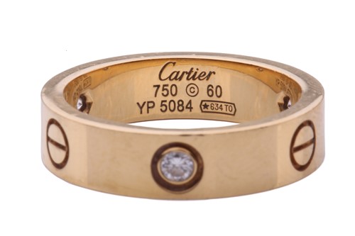 Lot 1 - Cartier - 'Love' ring, the polished band set...