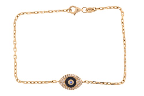 Lot 14 - An evil eye bracelet, consisting of a glass...